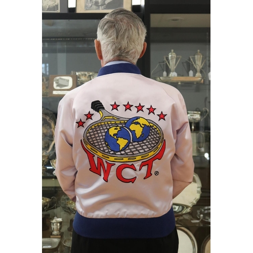 1278 - 1973 WCT Sports jacket & medal. Arthur Ashe defeated Ken Rosewall 6-4 6-2 5-7 1-6 6-2 in the semi-fi... 