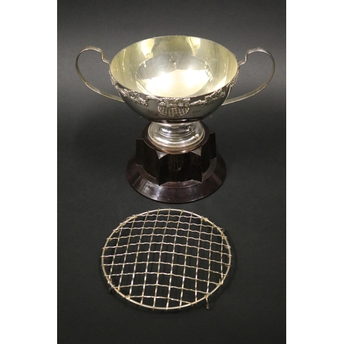 1117 - Twin handled tennis trophy. Inscribed, REPLICA of THE BRYLCREEM TENNIS CUP FOR THE BRYLCREEM WORLD P... 