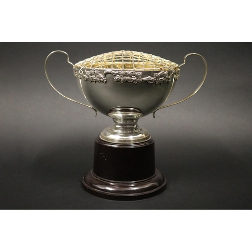 1118 - Twin handled tennis trophy. Inscribed, REPLICA of THE BRYLCREEM TENNIS CUP FOR THE BRYLCREEM WORLD P... 