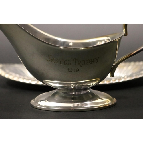 1121 - Tennis trophy in form of a sauceboat, inscribed SAFCOL TROPHY 1979. Approx 11cm H x 24cm W. Provenan... 
