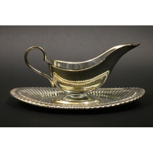 1121 - Tennis trophy in form of a sauceboat, inscribed SAFCOL TROPHY 1979. Approx 11cm H x 24cm W. Provenan... 