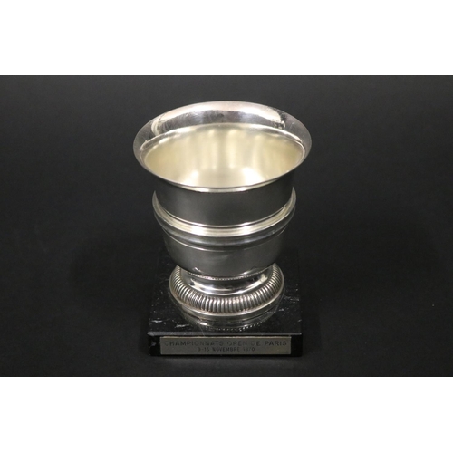 1130 - Tennis trophy. Inscribed, CHAMPIONNATS OPEN DE PARIS 9-15 NOVEMBRE 1970. Approx 9cm H x 8cm Dia. Pro... 