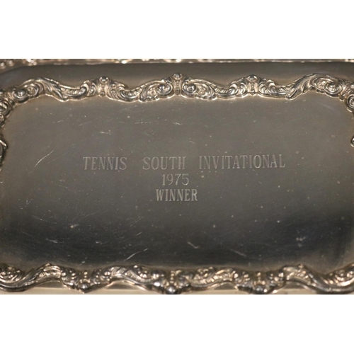 1129 - Tennis trophy. Inscribed, TENNIS SOUTH INVITATIONAL 1975 WINNER. EPNS twin handled entree dish. Appr... 