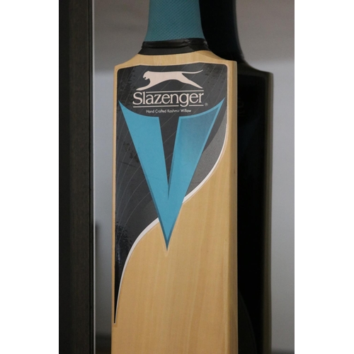 1400 - Signed Slazenger cricket bat on frame, Michael John Clarke 2004.
Michael John Clarke AO (born 2 Apri... 