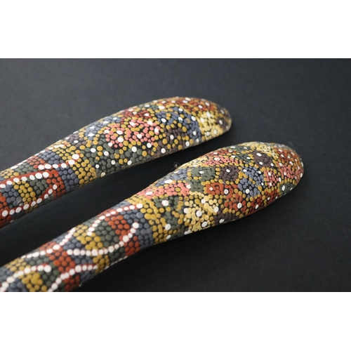 33 - Kitty Pultara Nabaljari, (Australian Aboriginal deceased) Pair of painted spoons, bean tree, dated 8... 