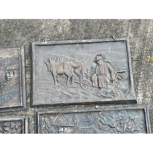 226 - Four cast bronze plaques, approx 53cm L x 29cm H & smaller (4)