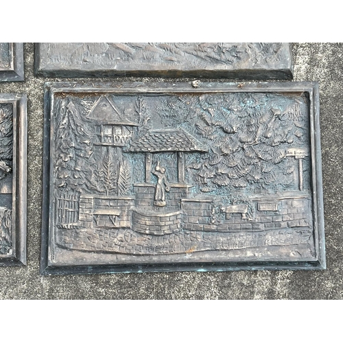 226 - Four cast bronze plaques, approx 53cm L x 29cm H & smaller (4)