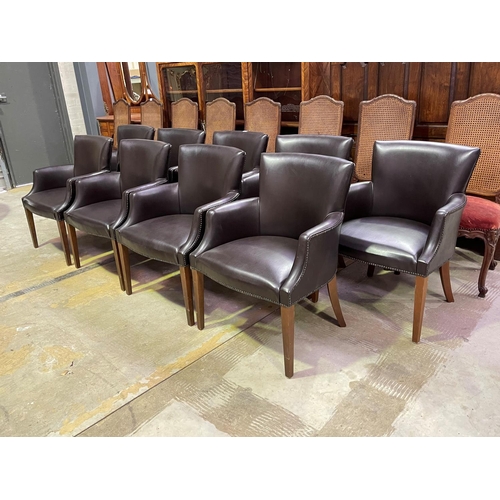 454 - Set of ten custom made dining armchairs, studded trim upholstery, standing on square tapering legs (... 