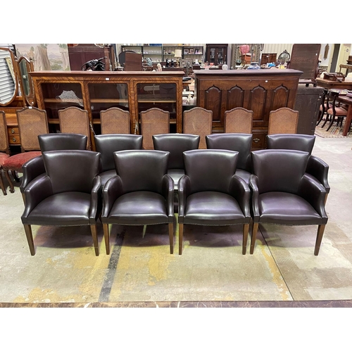 454 - Set of ten custom made dining armchairs, studded trim upholstery, standing on square tapering legs (... 