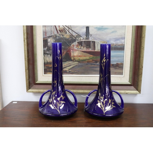11 - Pair of French cobalt blue porcelain twin handled vases with gilt highlights, each approx 35cm H (2)