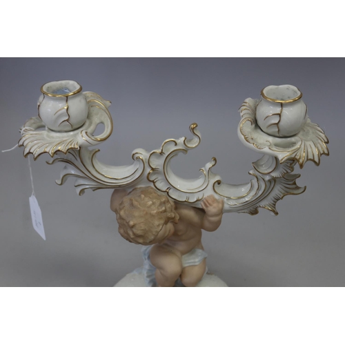 36 - Hutschenreuther porcelain figural candlestick, approx 28cm H x 28cm W