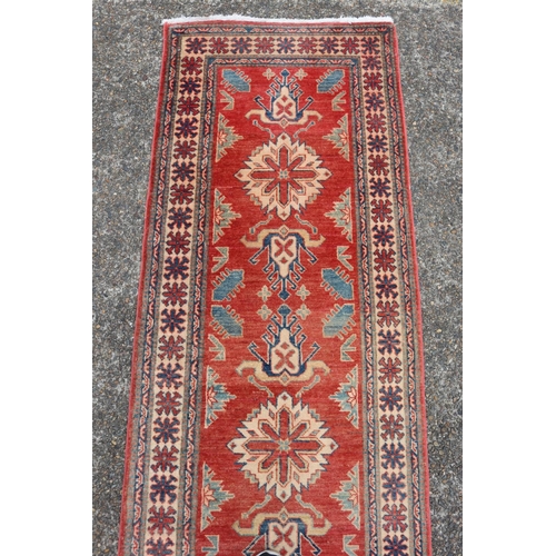 51 - Persian wool hall runner, central red ground field, approx 74cm X 250cm Ex Cadry's Sydney