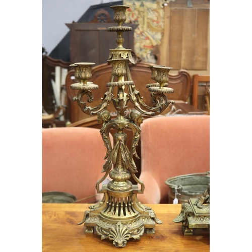 67 - Impressive large antique French gilt bronze mantle clock and pair of five stick candelabrum, all wit... 