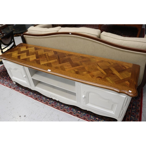84 - Modern French style entertainment unit, with white  painted frame & parquetry top, purchased through... 