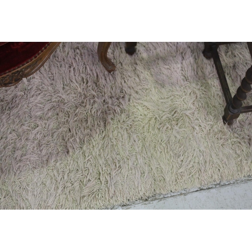 104 - Hairy wool carpet, approx 175cm x 247cm