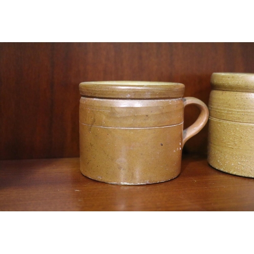 134 - Two antique French stoneware pots, approx 8.5cm H and smaller (2)