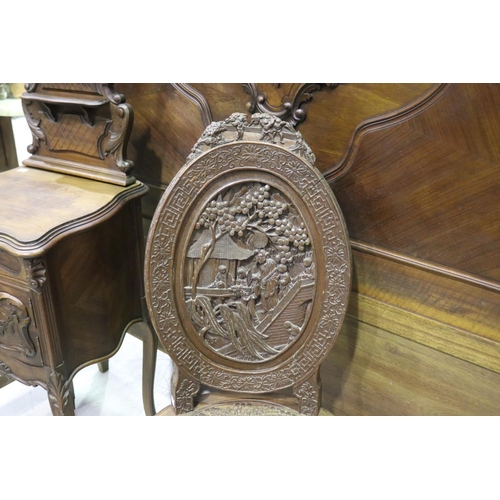 140 - Finely carved oak & teak Chinese salon chair. The front of the oval cameo back deeply carved with a ... 