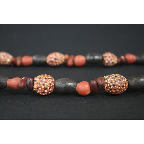 55 - Lisa Pultara (c1959-.) Australia (Aboriginal deceased) Painted beads, bean tree & gumnut, 1987, Anma... 