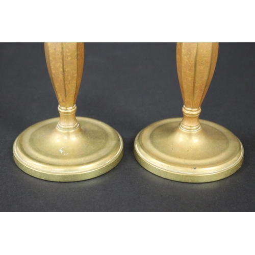 142 - Pair of antique French candlesticks, each approx 12cm H (2)