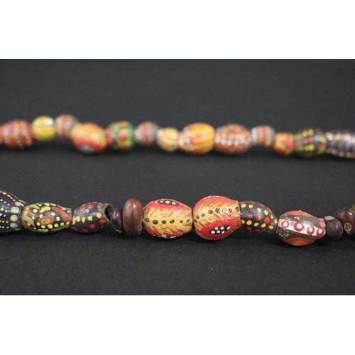 54 - Lisa Pultara (c1959-.) Australia (Aboriginal) (deceased) painted beads, bean tree & gumnut, 1987, An... 