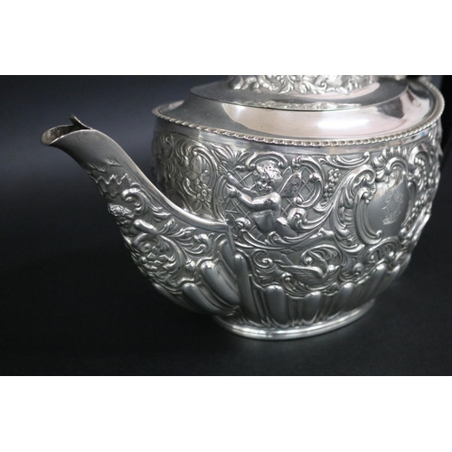 75 - Victorian sterling silver teapot and matching double-handled sugar bowl with ornate repousse design ... 