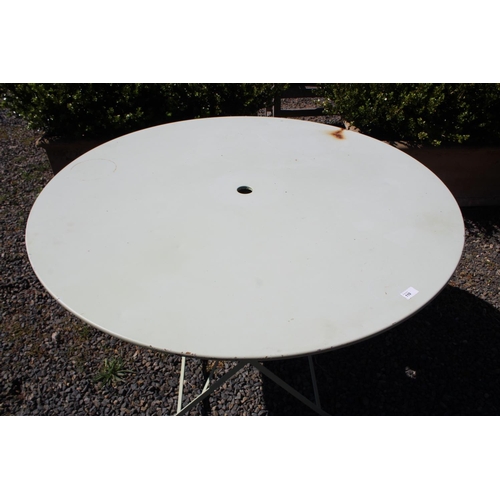 110 - Pale green painted large circular folding base garden table, approx 74cm H x 116.5cm dia