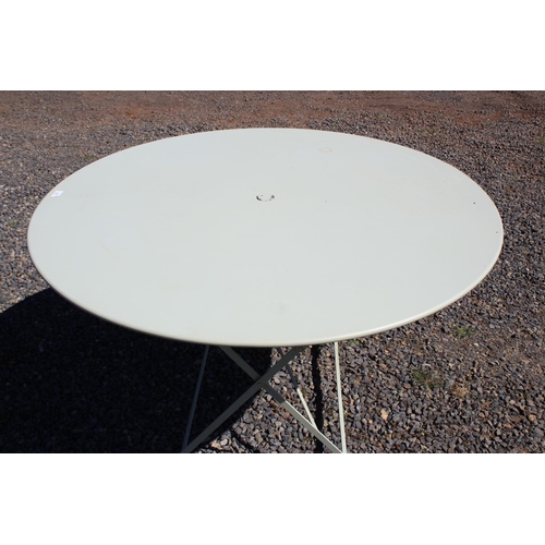 111 - Pale green painted large circular folding base garden table, approx 73cm H x 116.5cm dia