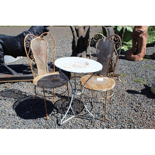 167 - Pair of metal garden chairs and an antique small circular French garden table (3)