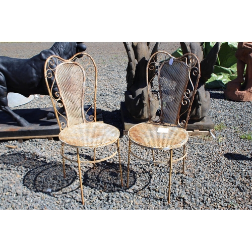 167 - Pair of metal garden chairs and an antique small circular French garden table (3)