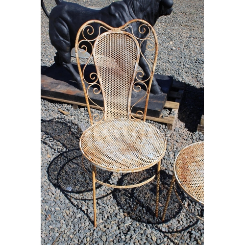 167 - Pair of metal garden chairs and an antique small circular French garden table (3)