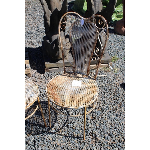 167 - Pair of metal garden chairs and an antique small circular French garden table (3)