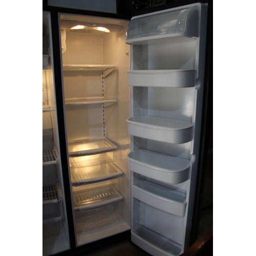 288 - Amana two door refrigerator , good clean condition (running)