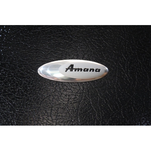 288 - Amana two door refrigerator , good clean condition (running)