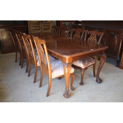 394 - Vintage Chippendale revival dining suite comprising a extension dining table, and matching set of ei... 