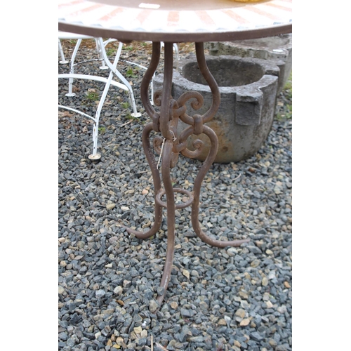 125 - Tiled top circular garden table with wrought iron base, approx 79cm H x 80cm Dia