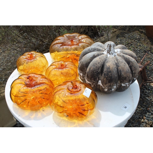 127 - Seven pumpkins, six amber glass and one pottery, approx 23cm Dia and smaller  (7) please note an ext... 