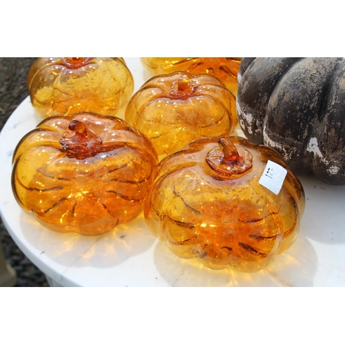 127 - Seven pumpkins, six amber glass and one pottery, approx 23cm Dia and smaller  (7) please note an ext... 