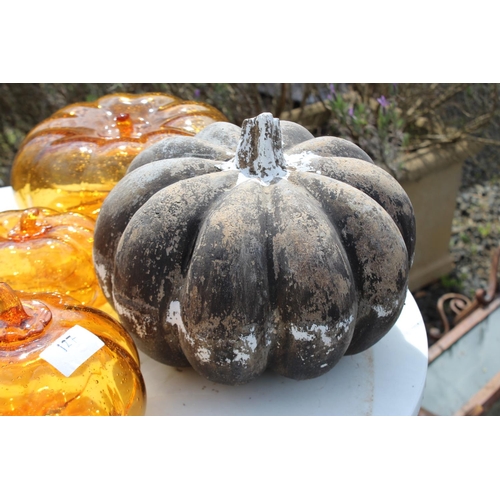 127 - Seven pumpkins, six amber glass and one pottery, approx 23cm Dia and smaller  (7) please note an ext... 