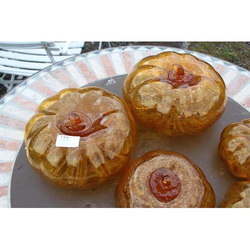 130 - Six amber glass pumpkins, approx 21cm Dia and smaller (6) please note an extra one has been added to... 