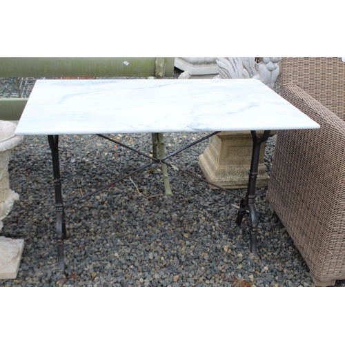 173 - Antique French marble topped iron based bistro table, approx 70cm H x 100cm W x 65cm D