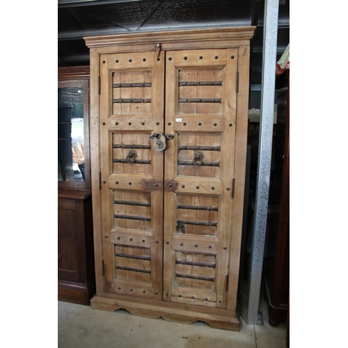 390 - Large Indian hardwood and iron mounted two door robe, approx 107cm W x 75cm D x 120cm H
