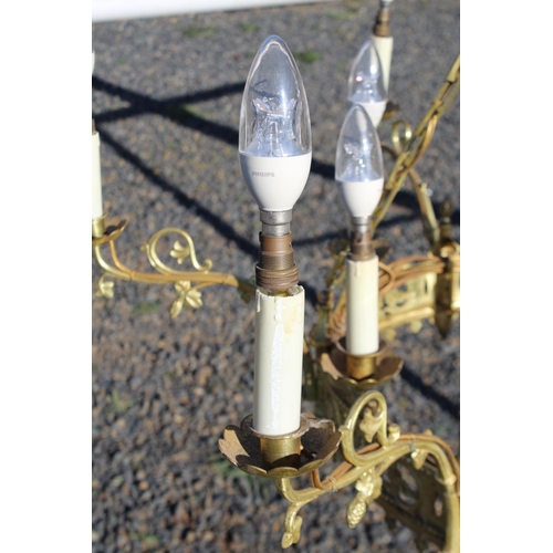 595 - Gilt brass Renaissance revival style 12 light chandelier