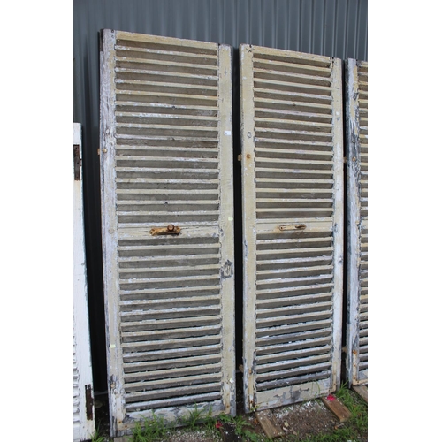85 - Three antique French grey painted shutters, approx 200cm H x 68cm W and narrower (3)