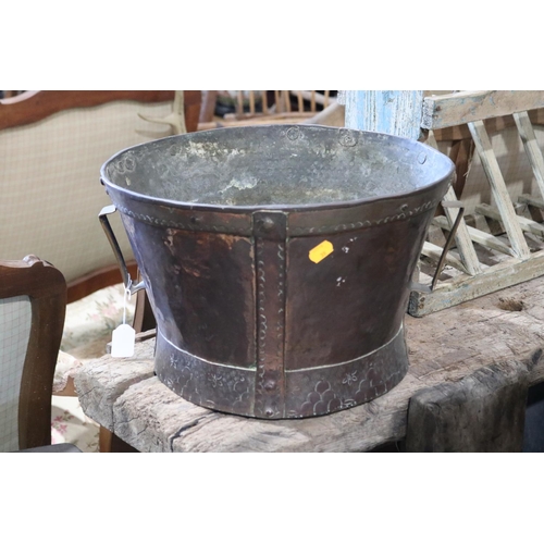 407 - Large antique Copper and brass twin handled pot, with hand beaten decoration to bands, approx 25cm H... 