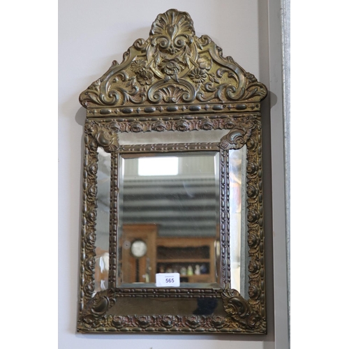 565 - Antique French repousse brass cushion mirror, approx 60 cm x 33 cm