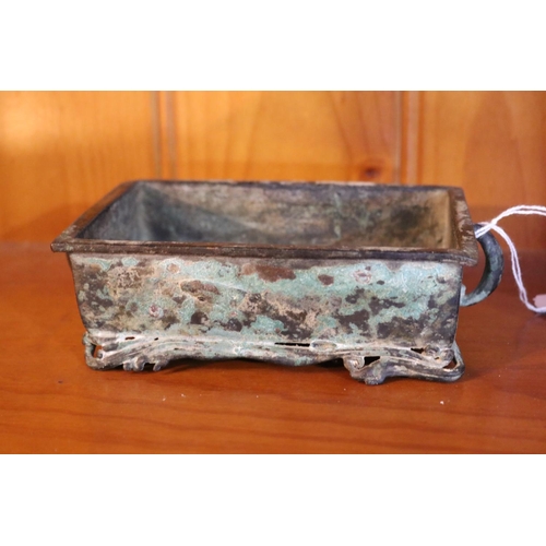 505 - Antique early Chinese bronze censer, of rectangular shape, applied loop handles, cast in relief to t... 