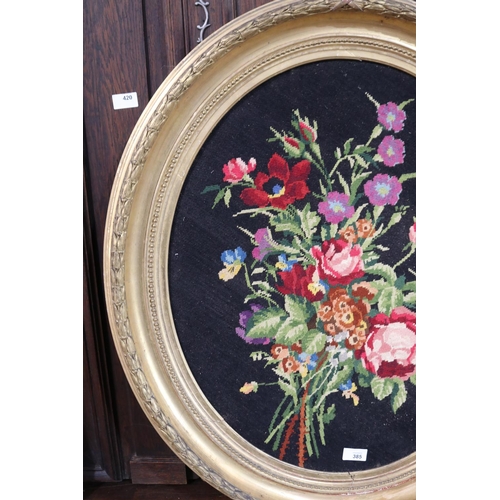385 - Antique 19th century French oval giltwood and gesso frame, with later wool work panel, frame approx ... 