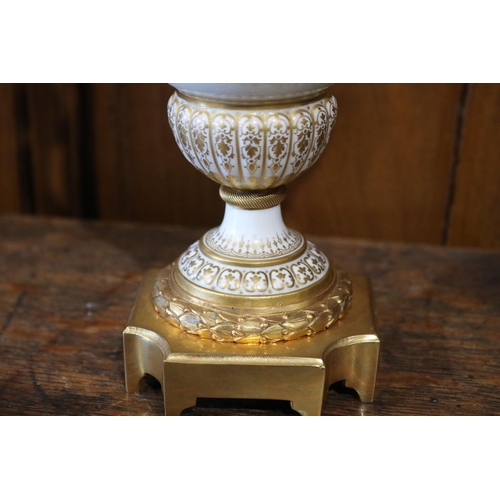 548 - Fine antique French porcelain urn with female term handles, and stepped ormolu base, signed I Marcha... 