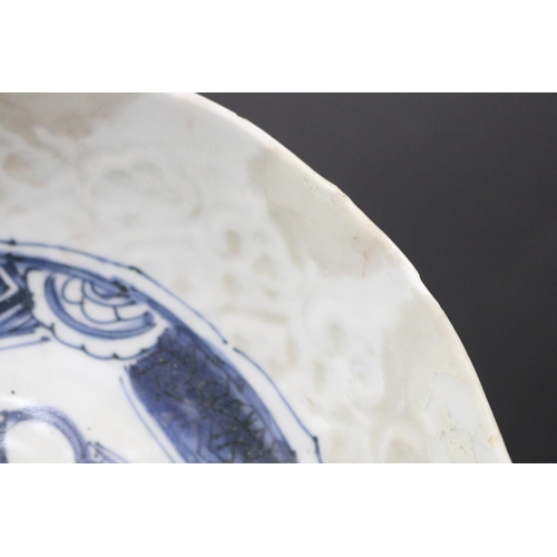 134 - Antique early Chinese porcelain bowl with central blue and white decoration. (restorations) Approx 2... 