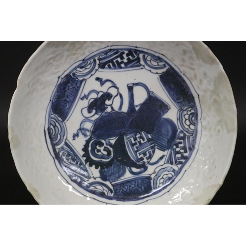 134 - Antique early Chinese porcelain bowl with central blue and white decoration. (restorations) Approx 2... 